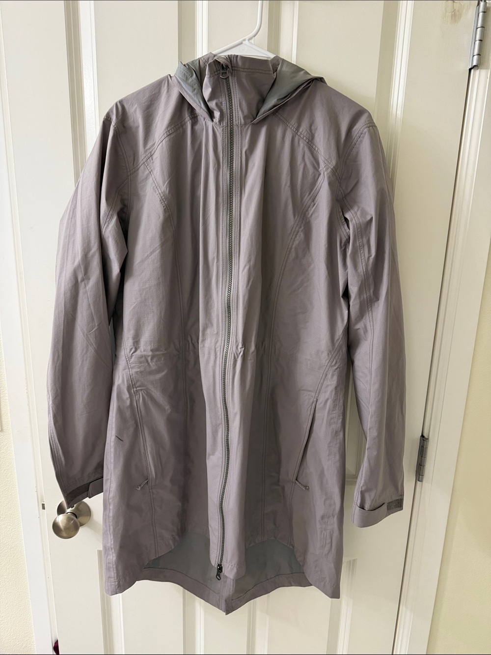 Kuhl Lightweight Hooded Rain Jacket in Light Gray